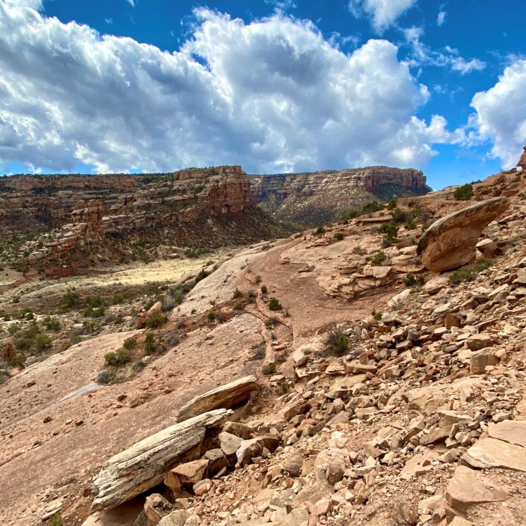 Serpents Trail Hiking Colorado National Monument ascent with rock walls